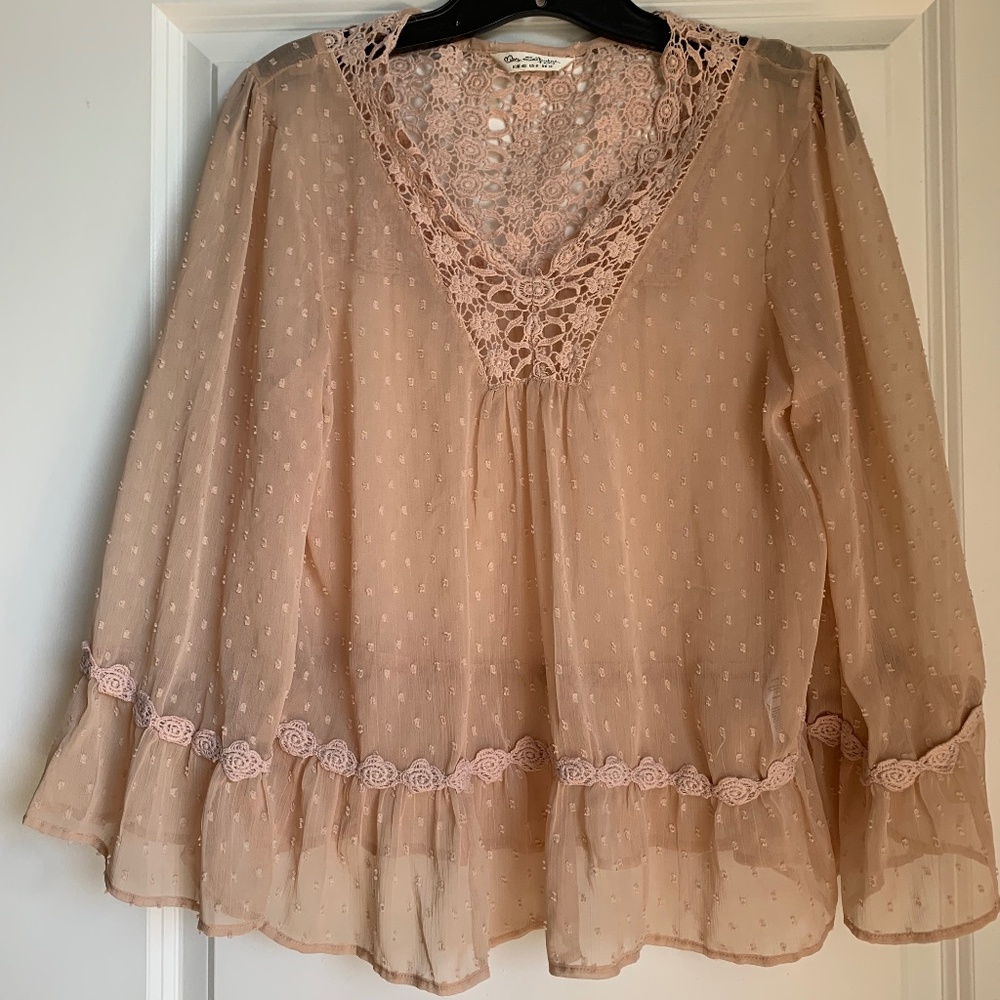 Sheer blush colored top with crochet